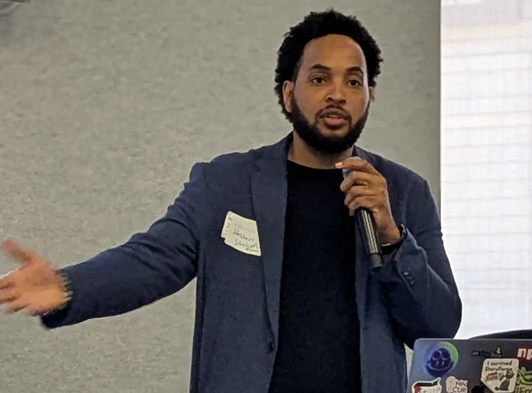 Hassan delivers his talk